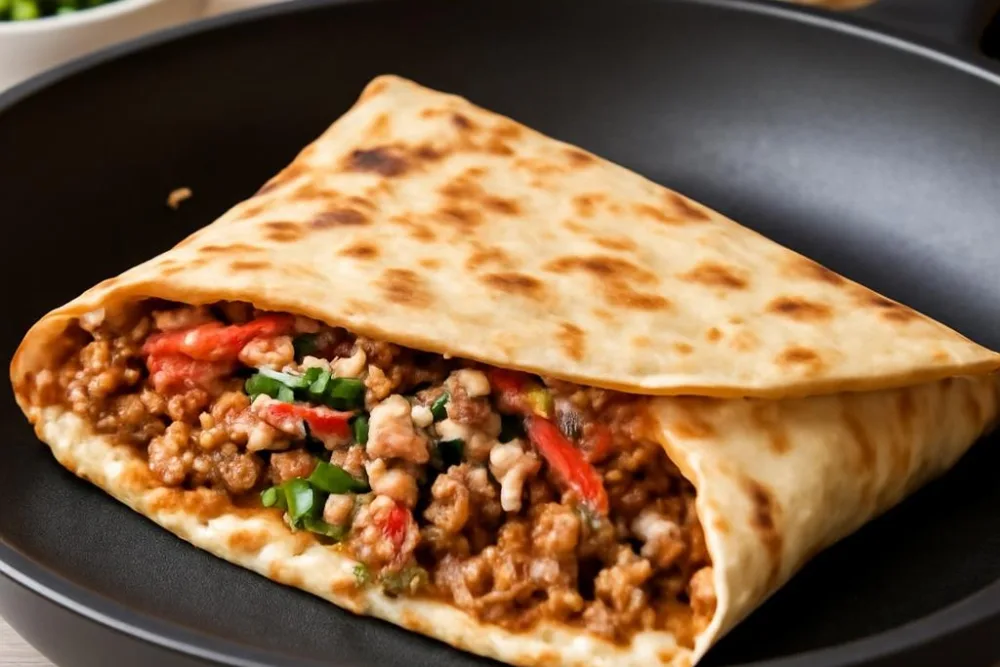 Як смачно приготувати лаваш з фаршем на сковороді